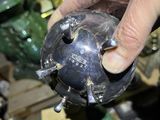 a person holding a metal object in their hand