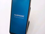 an image of a close up of a cell phone on a stand