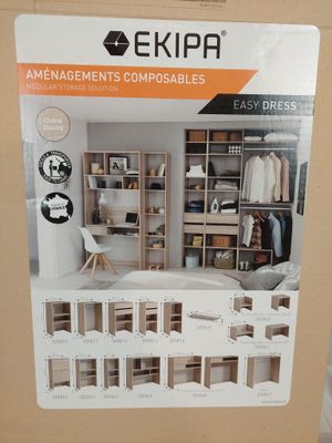 la boîte est ouverte pour montrer le contenu d'une chambre à coucher