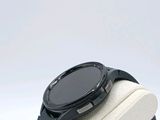 a smart watch sitting on top of a display stand