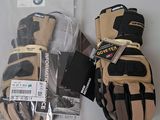 a pair of gloves and a pair of gloves on a table