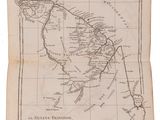 an old book with a map on top of it