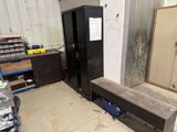 an image of a room with a refrigerator and a bench in it