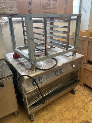 Table de cuisson inox ELECTROLUX mobile 380 V à 6 feux vifs et pied su