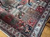 a close up of a rug on a wooden floor in a living room