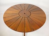 an image of a wooden table with a circular design on it