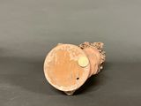 a small piece of wood that is sitting on a table