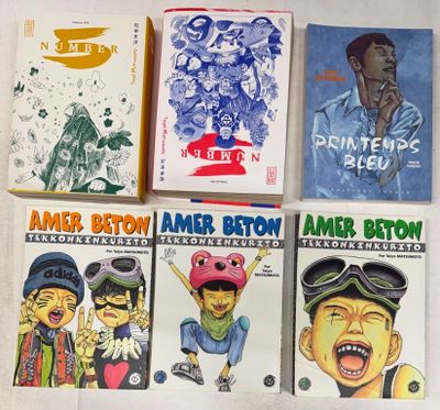 cinq livres pour enfants sont alignés sur une surface blanche