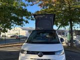 the volkswagen e - golf is parked on the side of the road