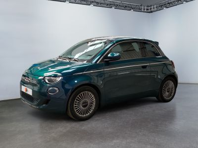 an image of a small blue car in a showroom