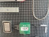 a close up of a wall with a bunch of electronic devices