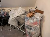 a pile of garbage in the corner of a room