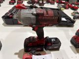 a cordless drill that is sitting on a table