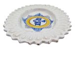 a white plate with a blue and yellow emblem on it