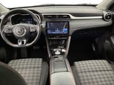 the interior of a car with a steering wheel, dashboard, and dash board
