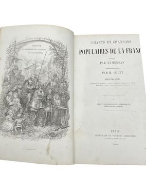 an open book with a picture of a group of people on it