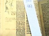 a book with a piece of paper on top of it