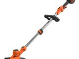 a corded string trimmer with a handle on a white background