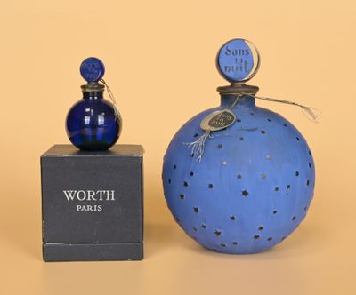 a small blue bottle and a small blue bottle sitting next to each other