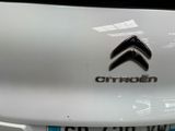 a close up of a citroen logo on the front of a car