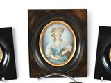 three framed pictures of a woman with a bird in her hand
