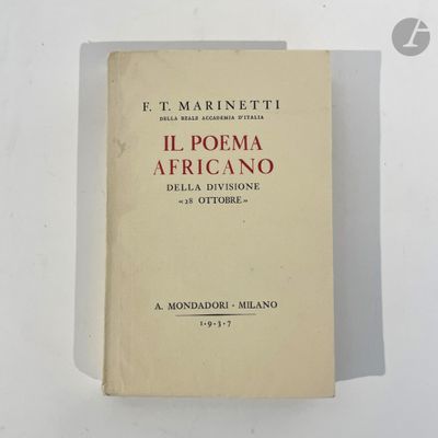 an old book sitting on top of a table next to a white wall