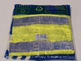a bag of yellow and blue tape sitting on a table