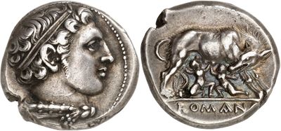 a silver coin with an image of a woman and a bull on it
