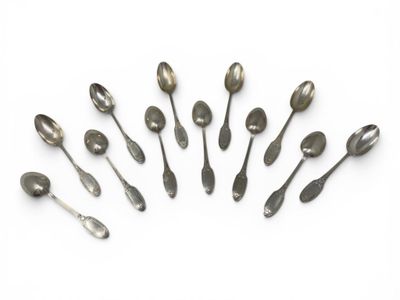 a lot of spoons and spoon spoons on a white surface
