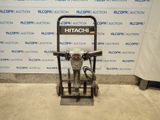 an image of a machine that is sitting in front of a wall