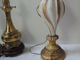 a lamp that is sitting on a table next to a lamp