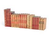 many old books stacked on top of each other