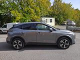 2020 honda cr - v parked in a parking lot with a trailer in the background