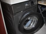 a washer and dryer stacked on top of each other