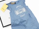 baby boy ' s blue short - sleeved t - shirt and shorts with a tag on it