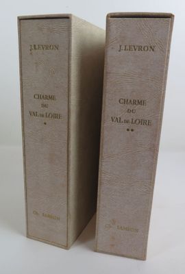 two books that are sitting side by side on a table