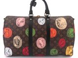 louis vuitton monogram canvas travel bag with multicolored circles