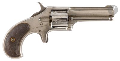 a close up of a revolver on a white background