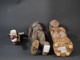 three different types of figurines on display on a table