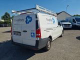 a white van that is parked in a parking lot