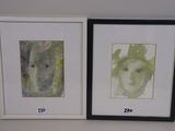 two framed pictures of a dog and a cat on the wall