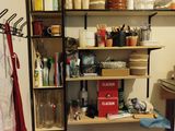 a shelf with many items on it in a room