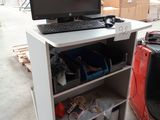 an image of a computer desk with a laptop on it