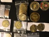 a lot of coins that are sitting on a table