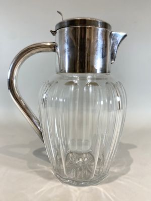 Important rafraichissoir en cristal taillé et monture en mét…