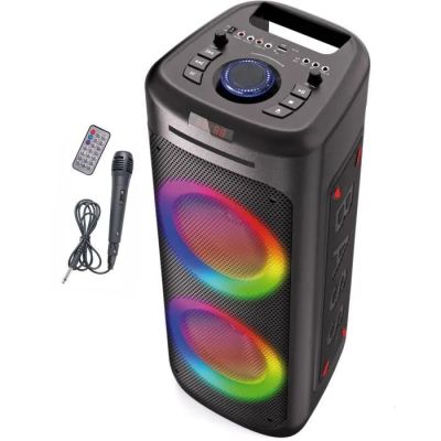 une image représentant une enceinte portable avec une télécommande et un chargeur