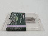 a picture of a pair of needles in a plastic container