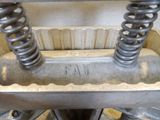 a close up of a machine with springs and springs on it