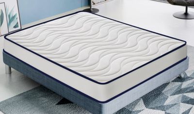 a mattress that is sitting on a table in a room