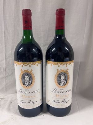 two bottles of red wine sitting next to each other on a table